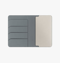 UNIQ Belmont passport holder Lichen Green Ivory - open with cards and passport