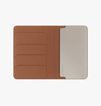 UNIQ Belmont Find My passport holder Caramel Ivory - open with passport and cards