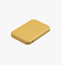 UNIQ Lexa 5000 power bank Canary Yellow - attached to a phone
