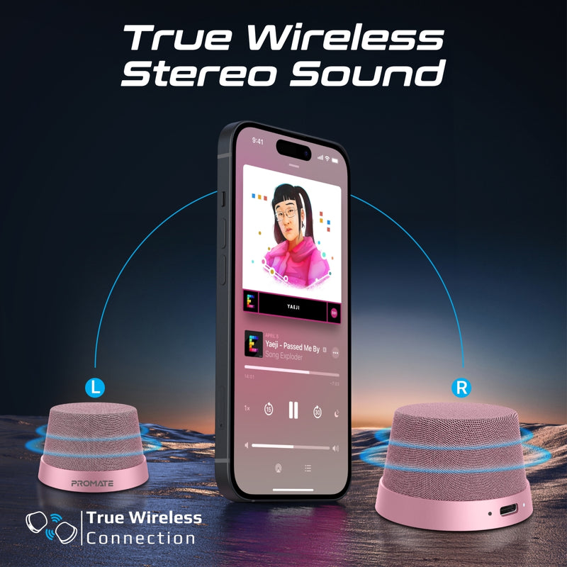 Promate Punch Pink speaker attached to iPhone MagSafe - angle view